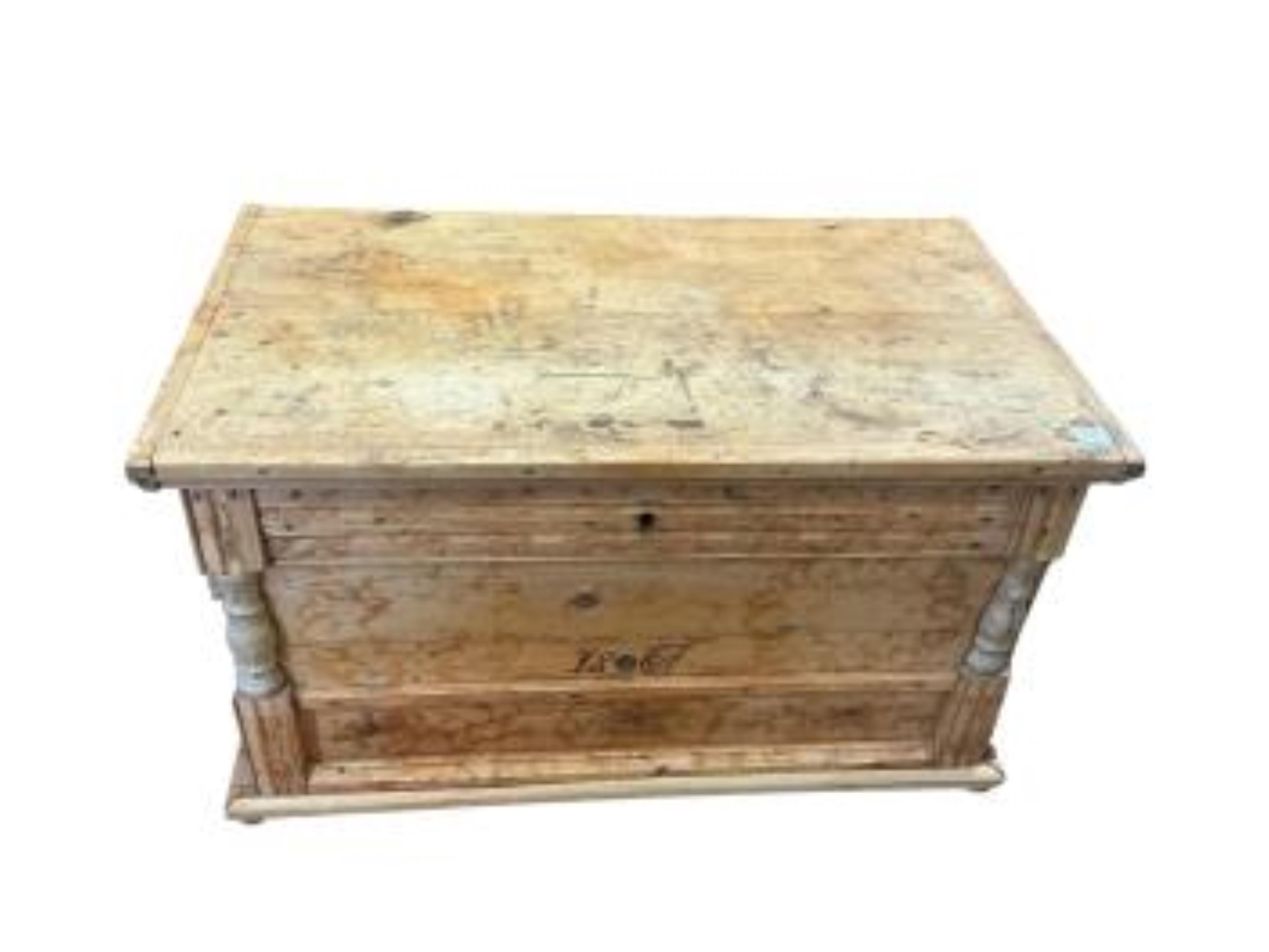 A 19th century Continental pine trunk, width 113cm, depth 64cm, height 65cm